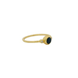 Thin ring with round stone and zircons