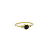 Thin ring with round stone and zircons