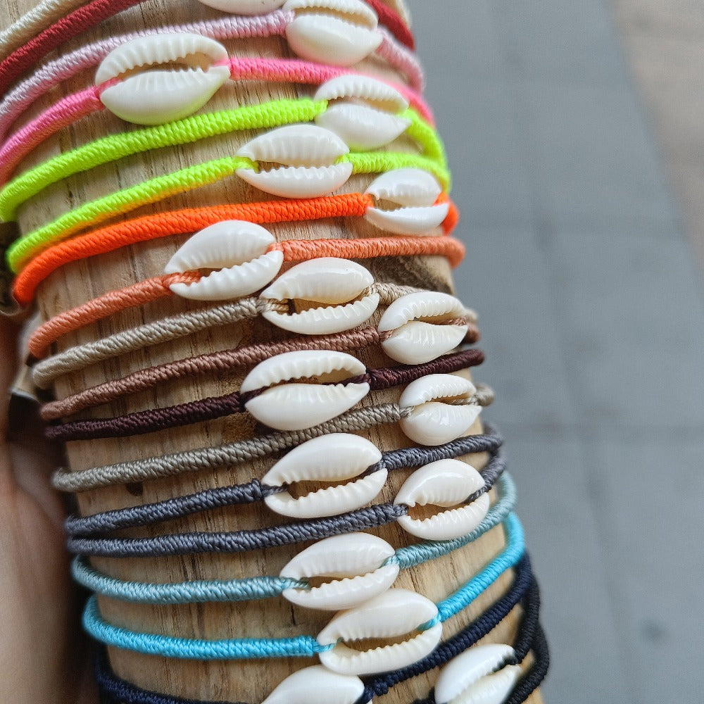 Colorful cord and natural cowrie bracelet