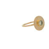 Hammered round gold ring with stone