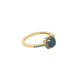 Golden solitaire ring with zircons and square stone