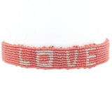 Bracelet brésilien doré fil tissé corail et crème "love"