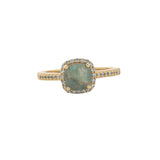 Golden solitaire ring with zircons and square stone