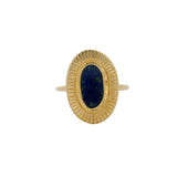 Oval gold ring and natural stone