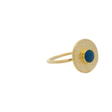 Hammered round gold ring with stone