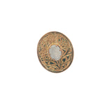 Gold ring engraved with flower and stone