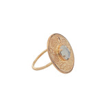Gold ring engraved with flower and stone