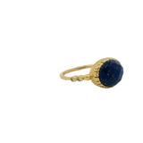Bague dorée pierre ovale facettée et zircons