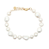 Bracelet doré perles de culture de différentes tailles fil blanc