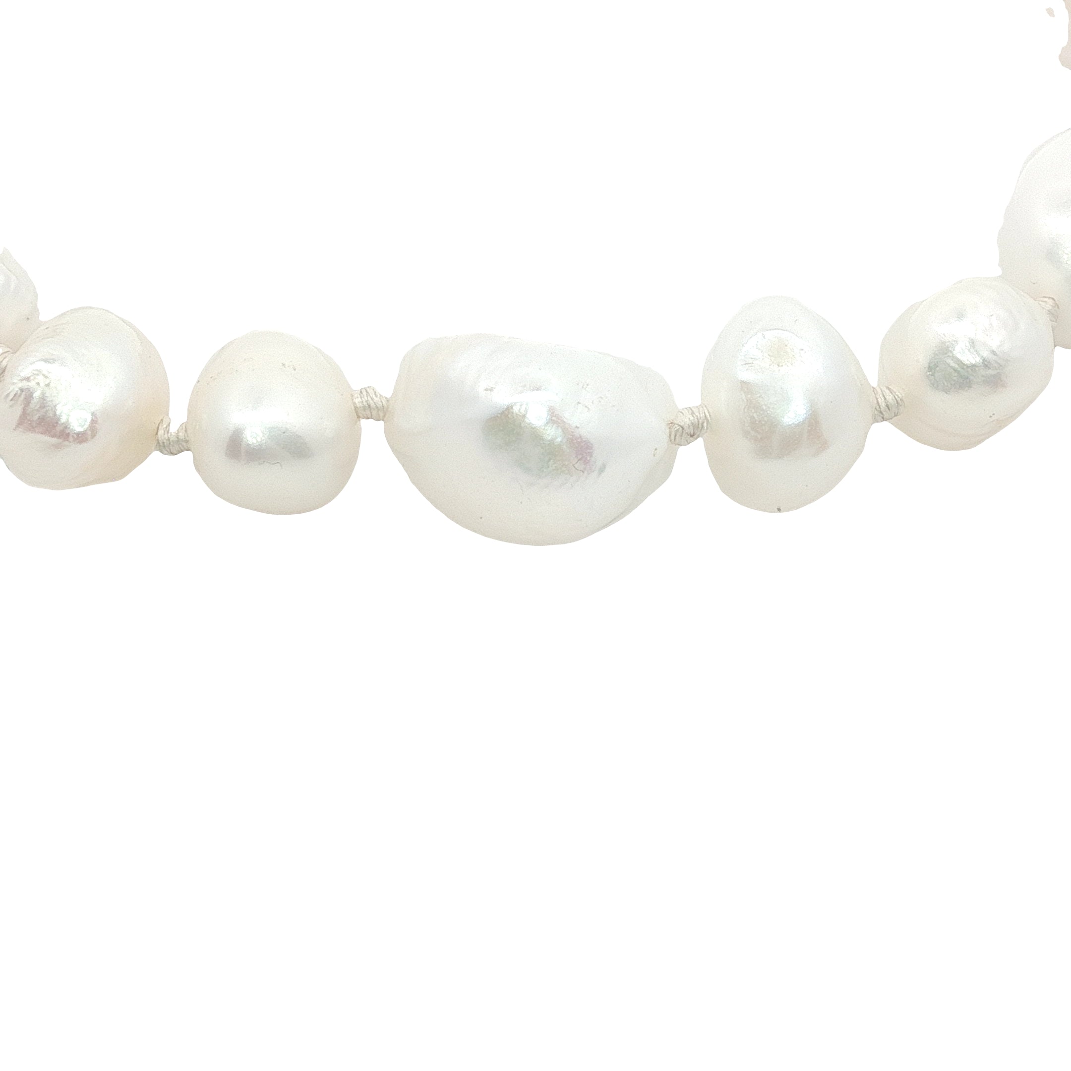 Bracelet doré perles de culture de différentes tailles fil blanc