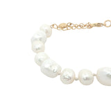 Bracelet doré perles de culture de différentes tailles fil blanc