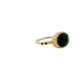 Bague dorée pierre ovale facettée et zircons