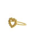 Golden ring with heart and zircons