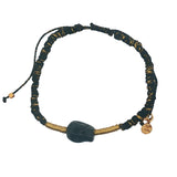 Bracelet cordon noir et doré tête de mort noire