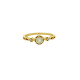 Bague dorée ajourée pierre et zircons