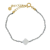 Bracelet doré petites pierres labradorite et trèfle en pierre de lune