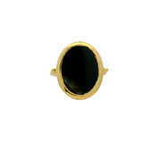 Gold ring and flat oval stone