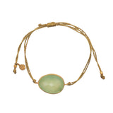 Gold cord bracelet with faceted stone