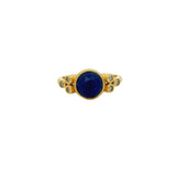 Bague dorée pierre ronde facettée et zircons
