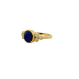 Bague dorée pierre ronde facettée et zircons