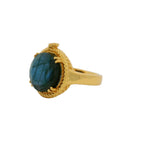 Golden ring with snake wrapped around a stone
