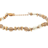 Bracelet doré perles fantaisie avec couronnes dorées