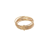Bague dorée 7 anneaux reliés par une barre