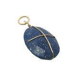 Charms doré lapis lazuli ovale facetté entouré d'un fil doré