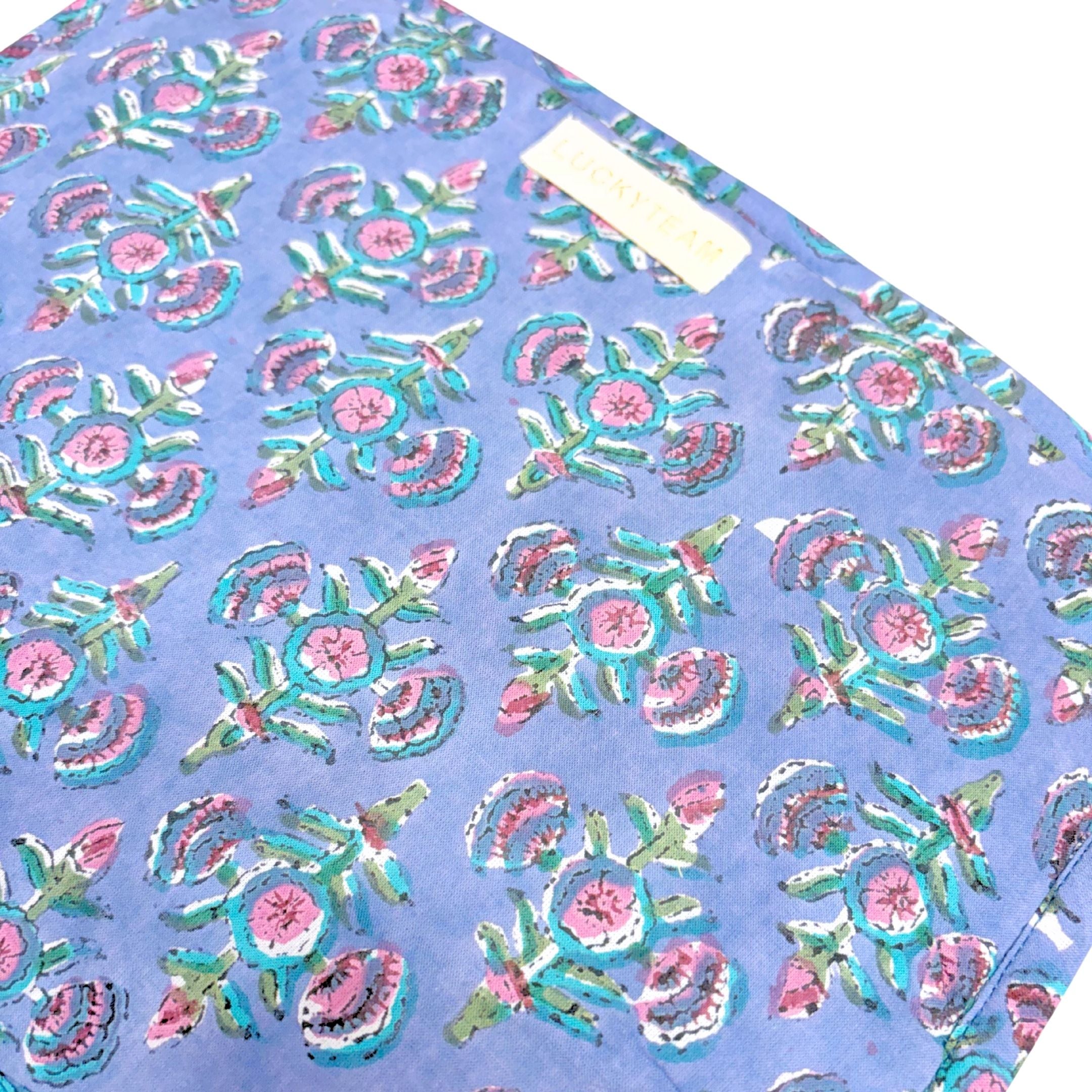 Grande pochette de voyage bleue à fleurs vertes et roses