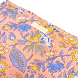 Grande pochette de voyage corail et bleue à fleurs blanches et jaunes