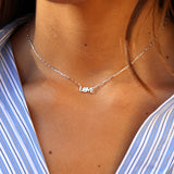 Silver love and zircon necklace