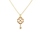 Collier doré clé trêfle coeurs