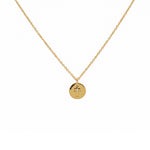 Collier doré pendentif médaille croix et zircon blanc