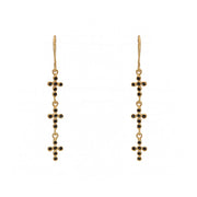 Boucles d’oreilles dorées et croix zircons noirs