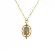 Collier dorée pendentif pierre cabochon pivotant -