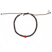 Bracelet perles bois et perle rouge