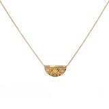 Gold necklace with engraved flower pendant