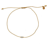 Bracelet tressé doré et perle