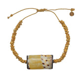 Bracelet cordon doré et coquillage
