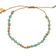 Bracelet cordon doré et pierres naturelles