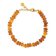 Bracelet corne orangée et disques dorés