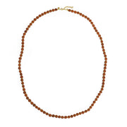 Sautoir graine de Rudraksha et perles dorées - Colliers